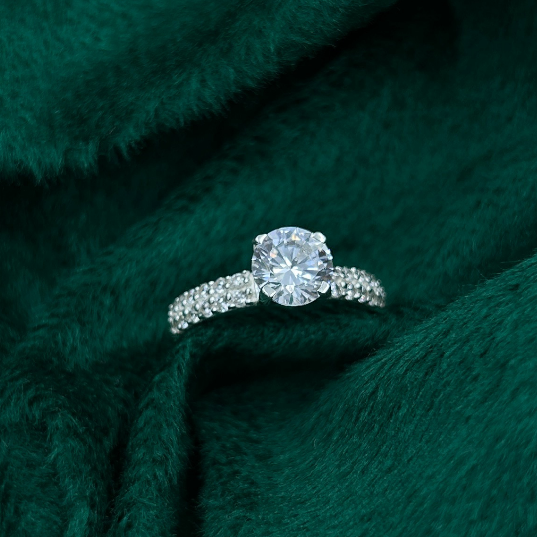 Crimson Crown – Sterling silver ring with  CZ center.