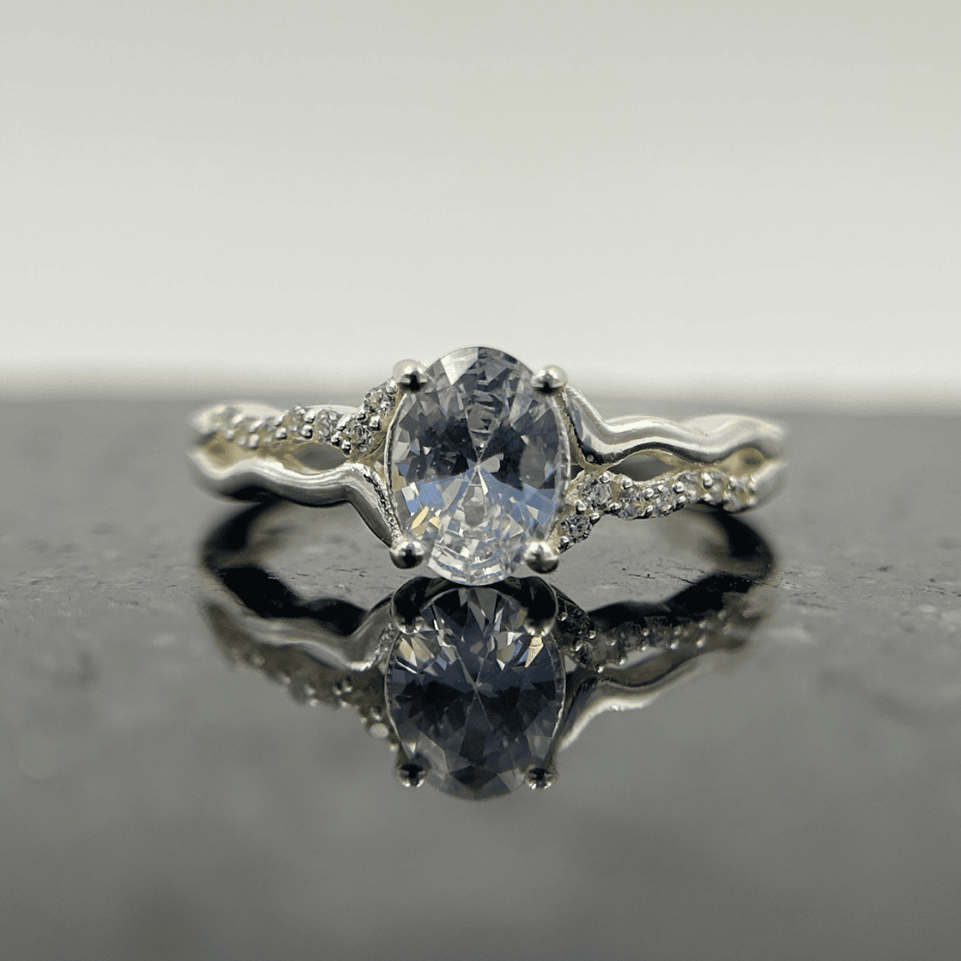 Oval Charm – Oval CZ with round sparkle.