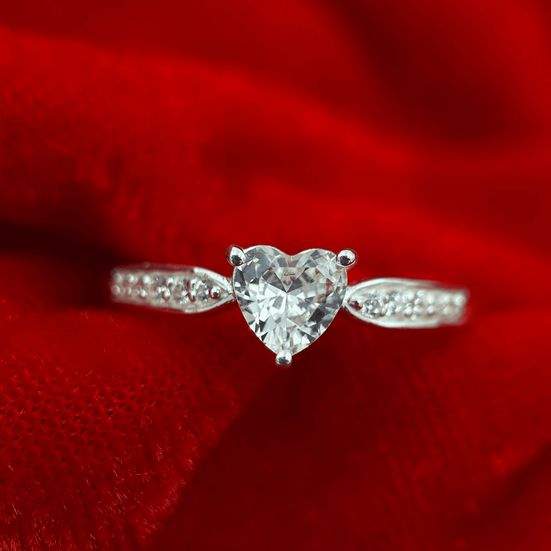 Sweetheart Shine – Heart-shaped CZ with round stones.