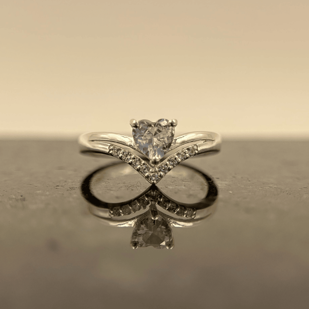 Lover’s Glow – Heart-cut CZ with shimmering accents.
